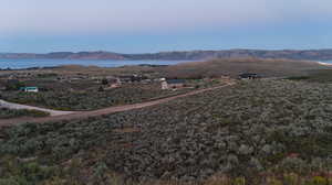 Exterior space featuring a water and mountain view