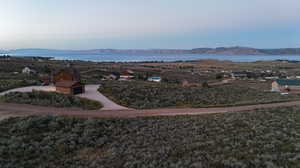 Exterior space featuring a water and mountain view