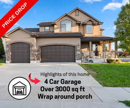 View of front of home featuring a 4 car garage, covered  wrap around porch, and a front lawn