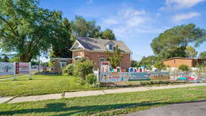 View of play area featuring a yard