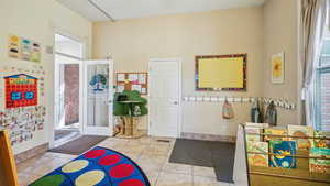 Interior space featuring light tile patterned floors