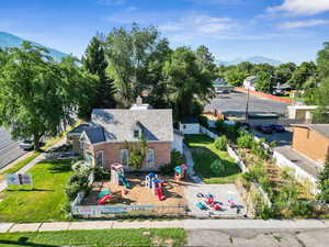 Birds eye view of property with a mountain view