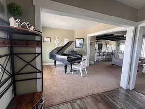 Miscellaneous room with hardwood / wood-style flooring