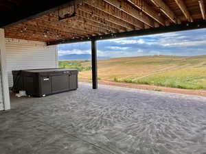 View of patio with a rural view