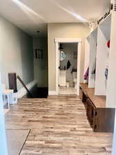 Mudroom with light wood-type flooring