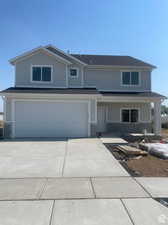 View of front property featuring a garage