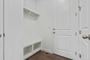 Mudroom featuring dark hardwood / wood-style flooring