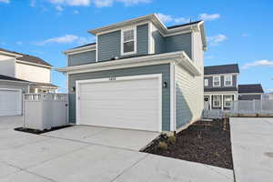 View of front property featuring a garage