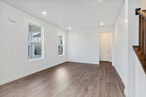 Unfurnished room featuring hardwood / wood-style floors