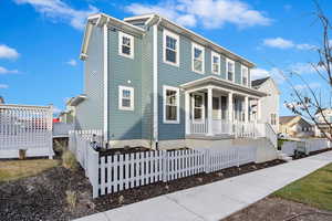 View of front of property featuring covered porch