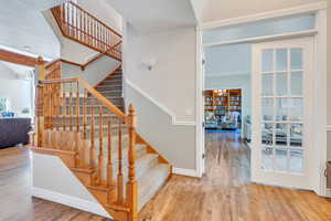 Expansive entry with French doors to sitting room