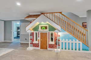 Adorable playroom under the stairs