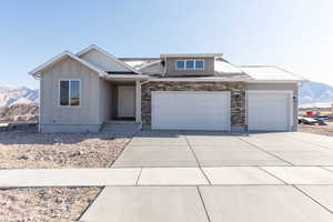 View of front of house featuring a mountain view