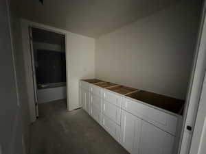 Bathroom with concrete flooring