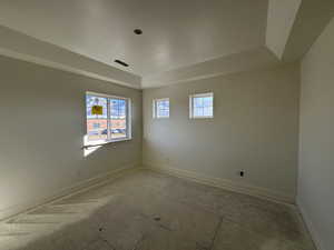 Empty room with a textured ceiling