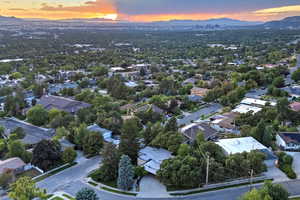 Aerial view at dusk featuring a mountain view