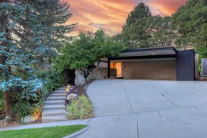 View of front of home featuring a carport