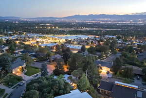 Aerial view at dusk featuring a mountain view