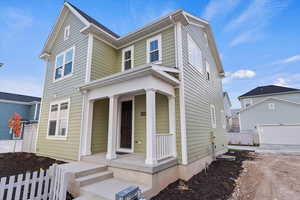 View of front of property featuring a garage