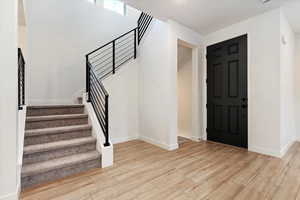 Foyer with light wood-type flooring