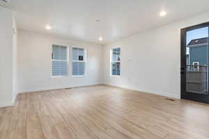 Spare room featuring light hardwood / wood-style floors