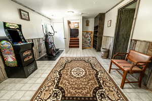 Hall with light tile patterned flooring