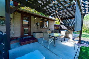 View of patio with a pergola