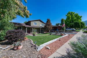 View of front of home with a front yard