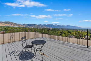 Rooftop with gorgeous mountain and city views.