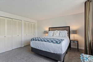 Spacious bedroom features Dual Closets.