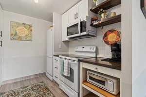 Beautifully updated kitchen, cabinetry and counters