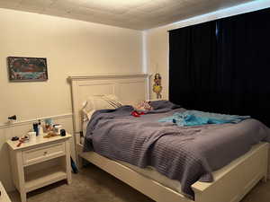 View of carpeted downstairs bedroom