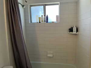 Bathroom with shower / tub combo