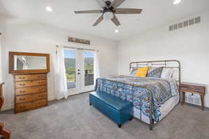 Primary bedroom featuring ceiling fan, french doors, and access to exterior