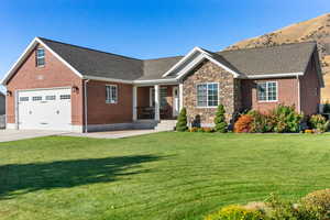 View of front of house with a front lawn