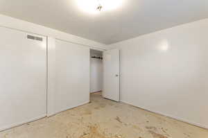 Unfurnished bedroom in basement.