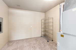 Interior space with a textured ceiling