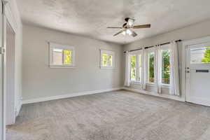 Unfurnished living room with tons of natural light!