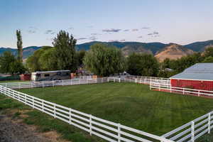 View of mountain feature with a rural view and RV parking