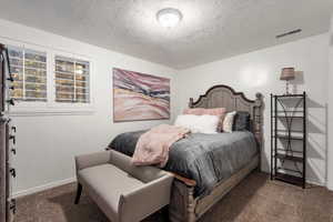 Bedroom with carpet flooring