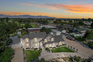 Aerial view at dusk featuring a mountain view