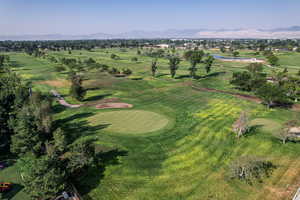 Birds eye view of property with a mountain view