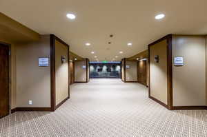 Hallway with light carpet