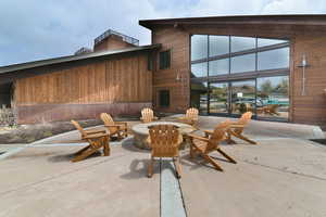 View of patio / terrace featuring an outdoor fire pit