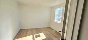 Unfurnished room featuring light hardwood / wood-style flooring