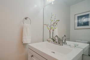 Bathroom with toilet and vanity