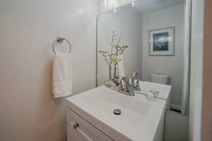 Bathroom with vanity and toilet