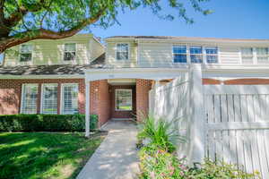 View of front of house with a front yard