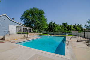 View of pool featuring a patio area