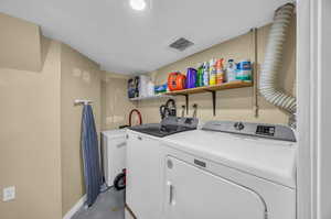 Laundry room featuring washer and dryer